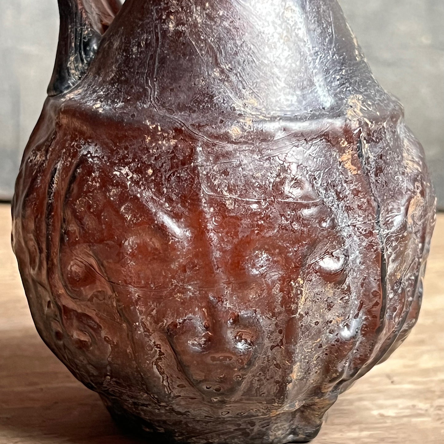A Roman Aubergine Glass Trefoil-Lipped Jug c. 1st Century A.D.