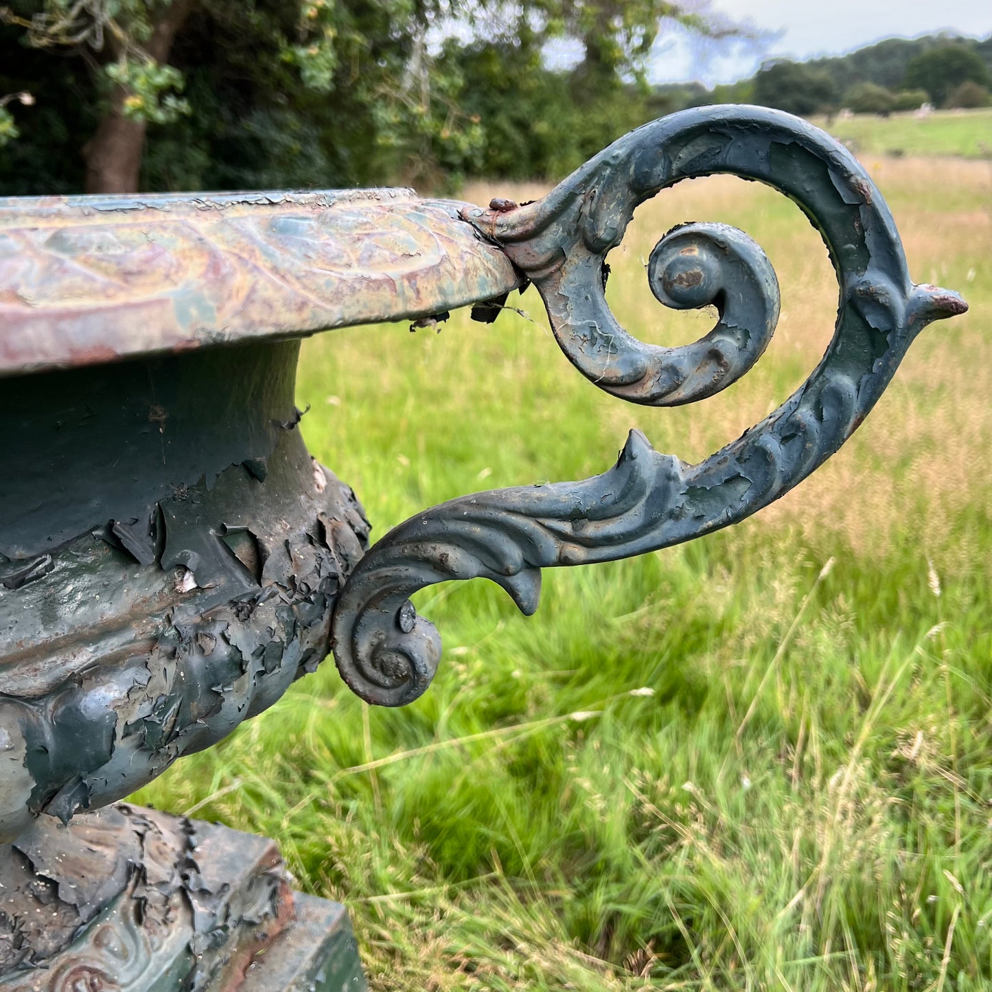 Pair of English Cast Iron Garden Urns with Plinths c.1870
