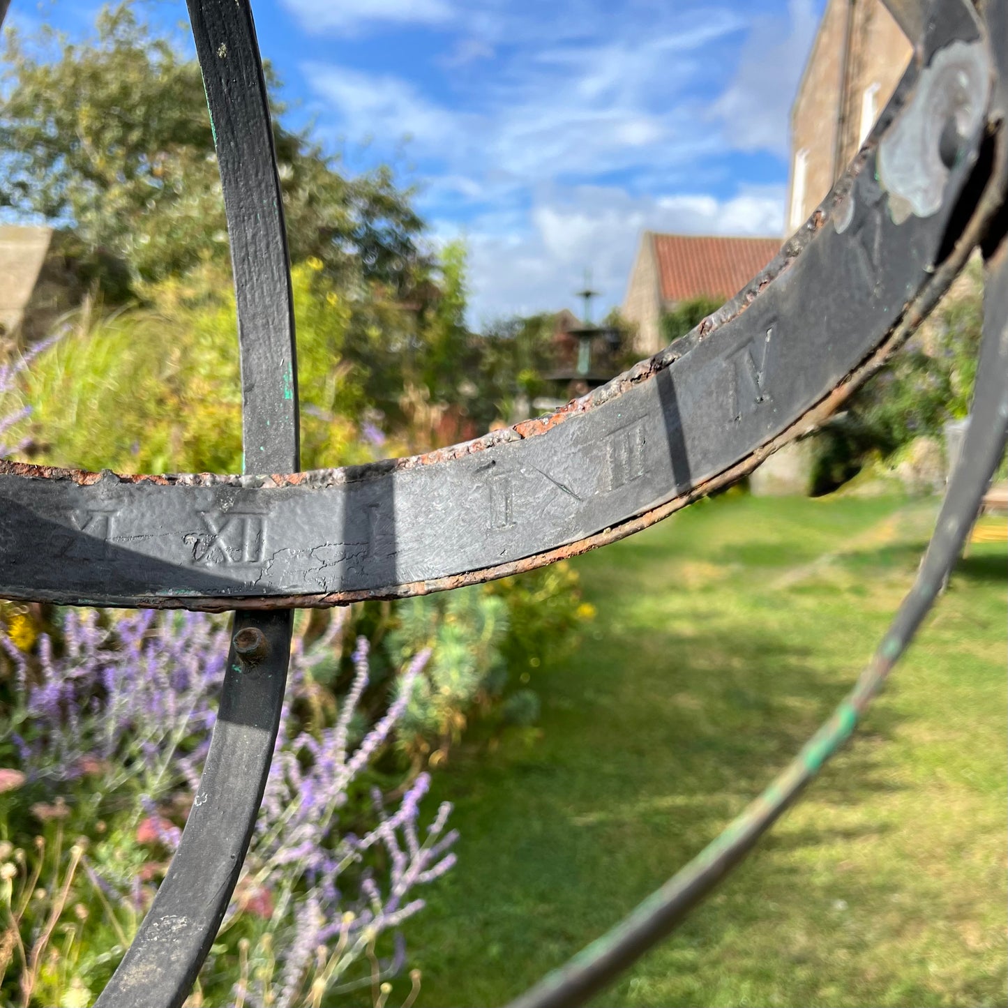 Wrought Iron Armillary Sphere upon English Carved Stone Column
