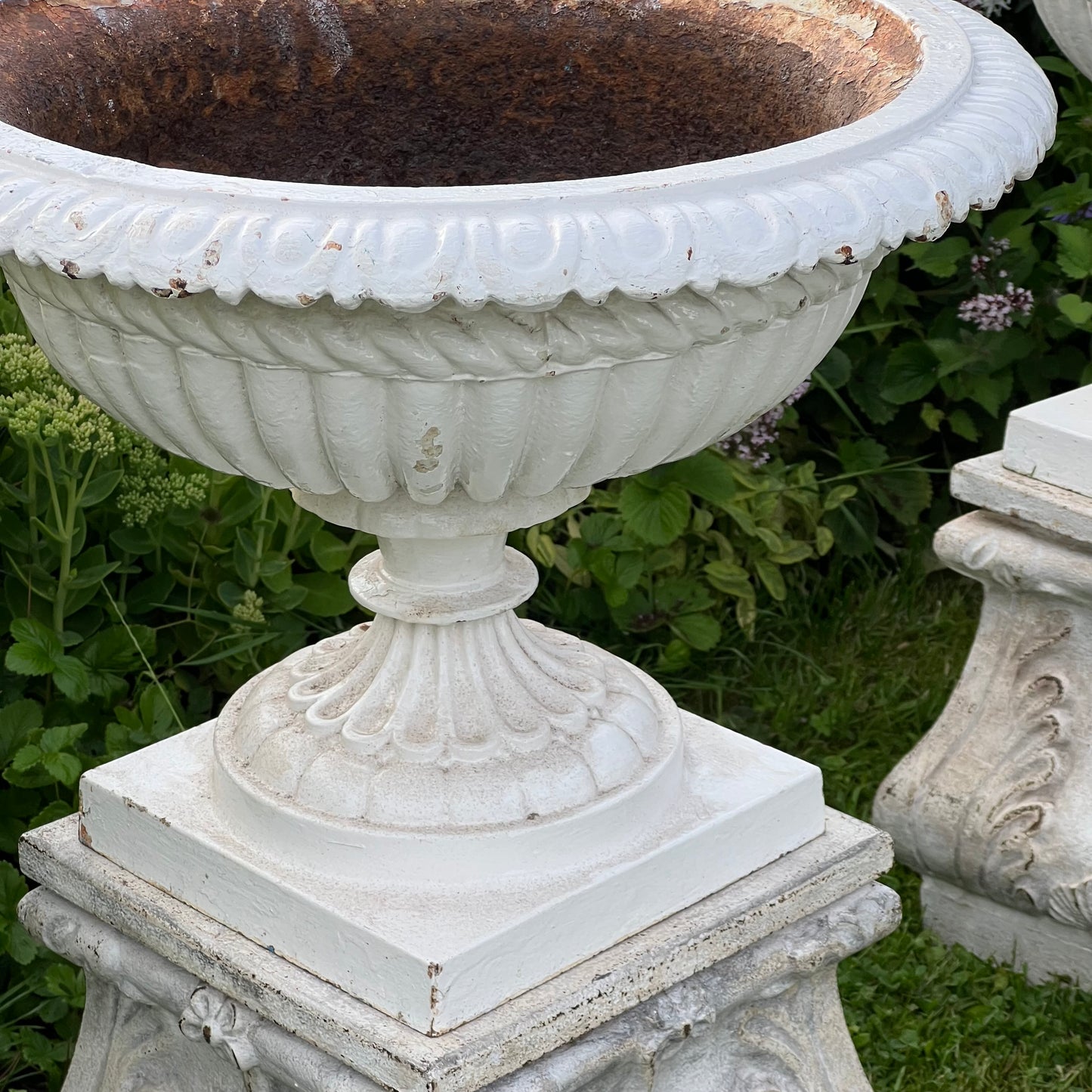 Pair of English Victorian Cast Iron Garden Urns on Ornamented Bases