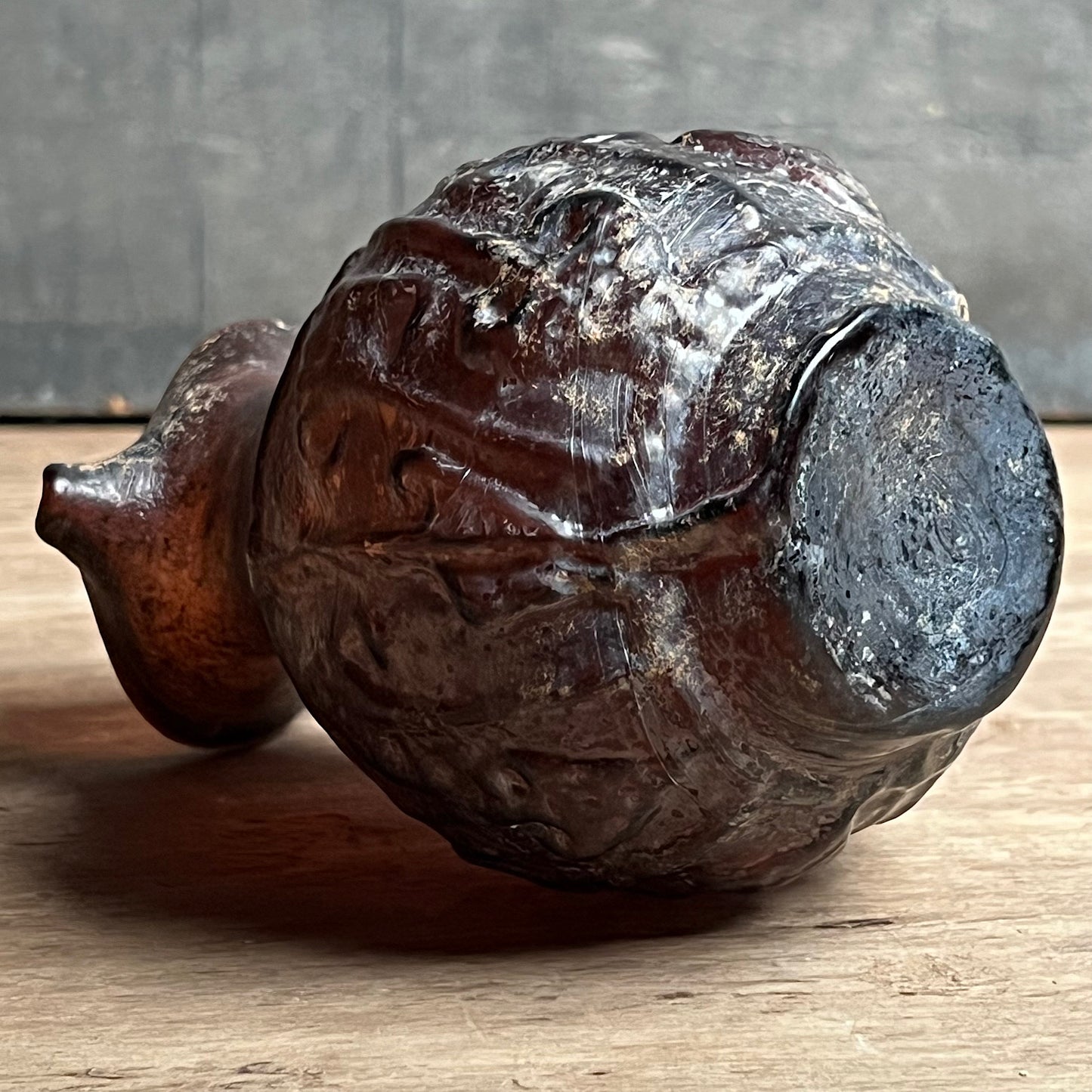 A Roman Aubergine Glass Trefoil-Lipped Jug c. 1st Century A.D.