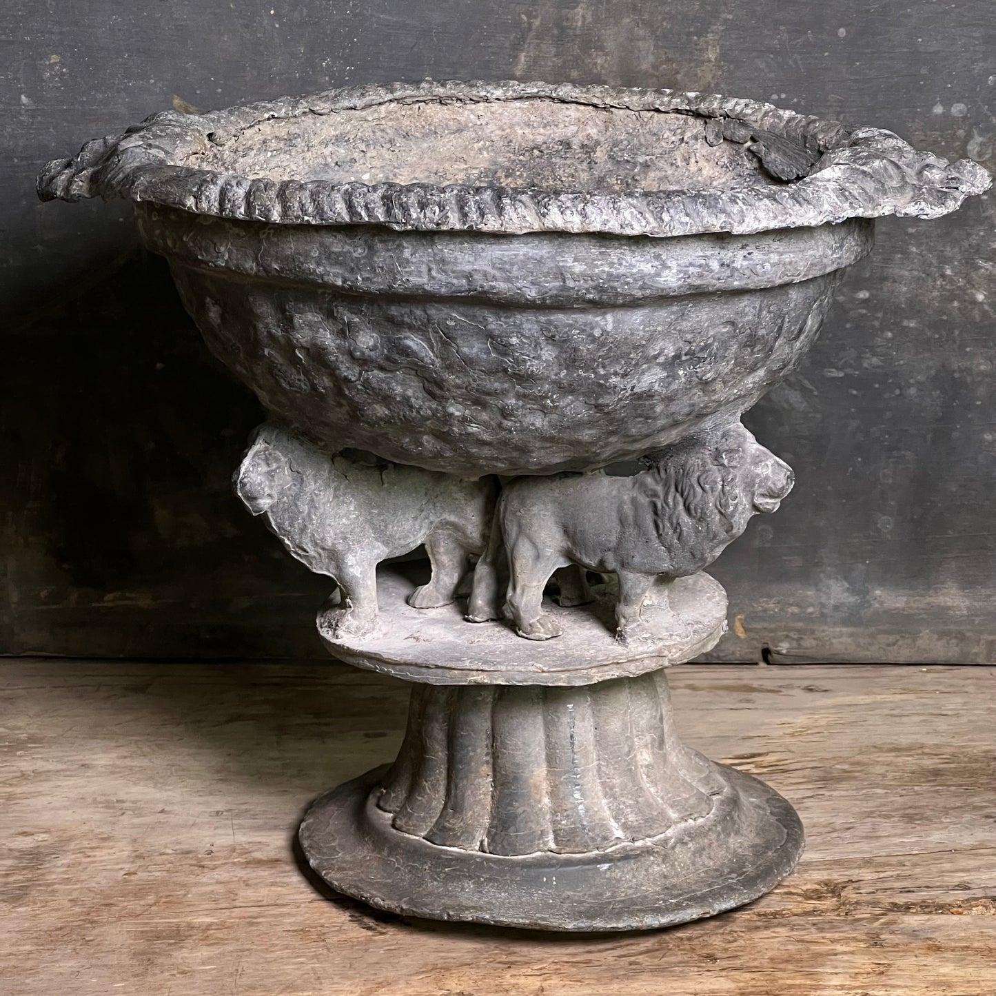 Pair of Georgian Lead Urns with Lion Supports, England c.1820