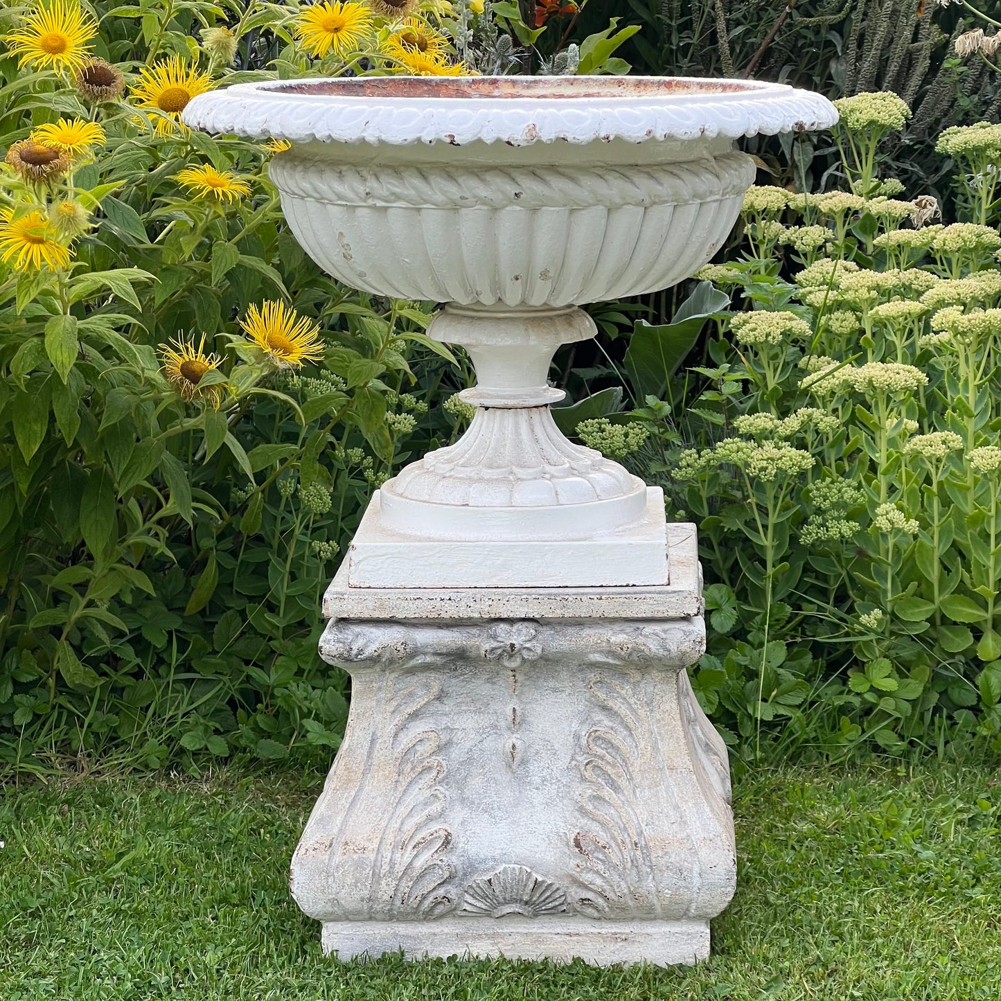 Pair of English Victorian Cast Iron Garden Urns on Ornamented Bases