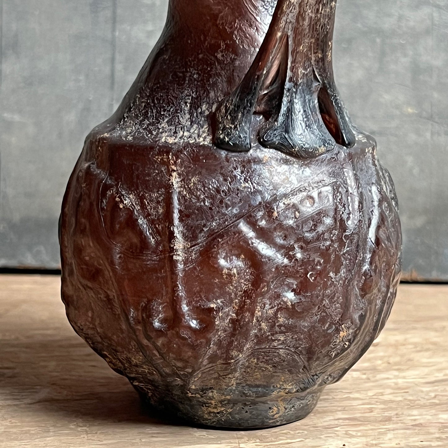 A Roman Aubergine Glass Trefoil-Lipped Jug c. 1st Century A.D.