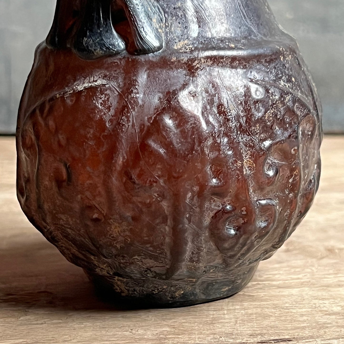 A Roman Aubergine Glass Trefoil-Lipped Jug c. 1st Century A.D.