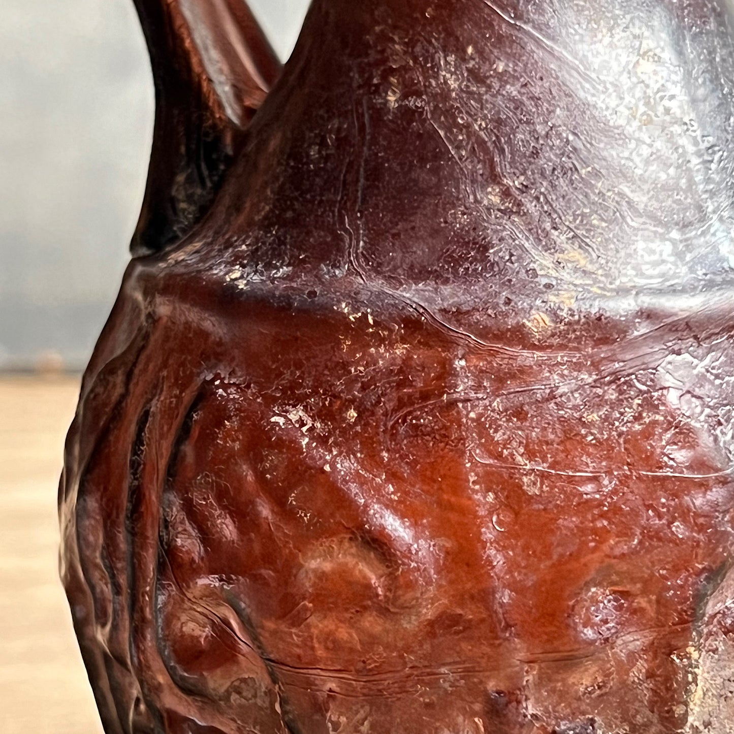 A Roman Aubergine Glass Trefoil-Lipped Jug c. 1st Century A.D.