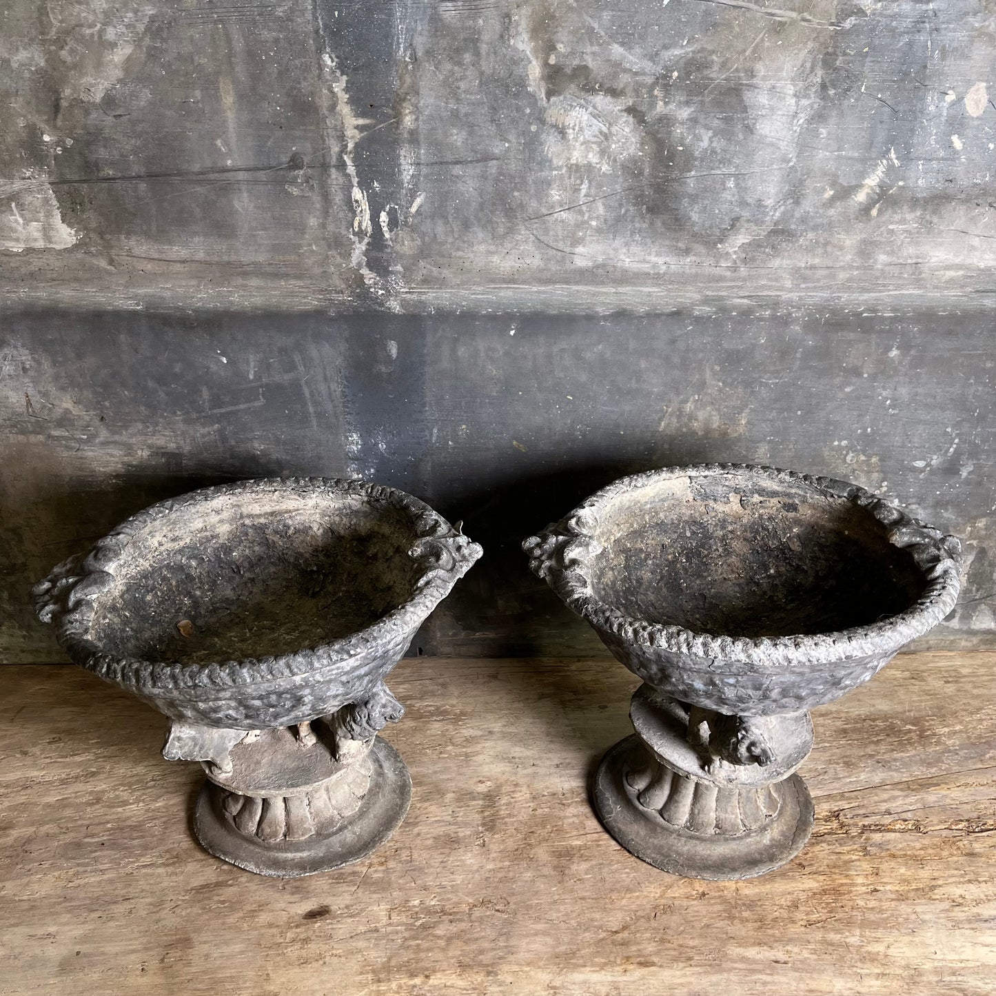 Pair of Georgian Lead Urns with Lion Supports, England c.1820
