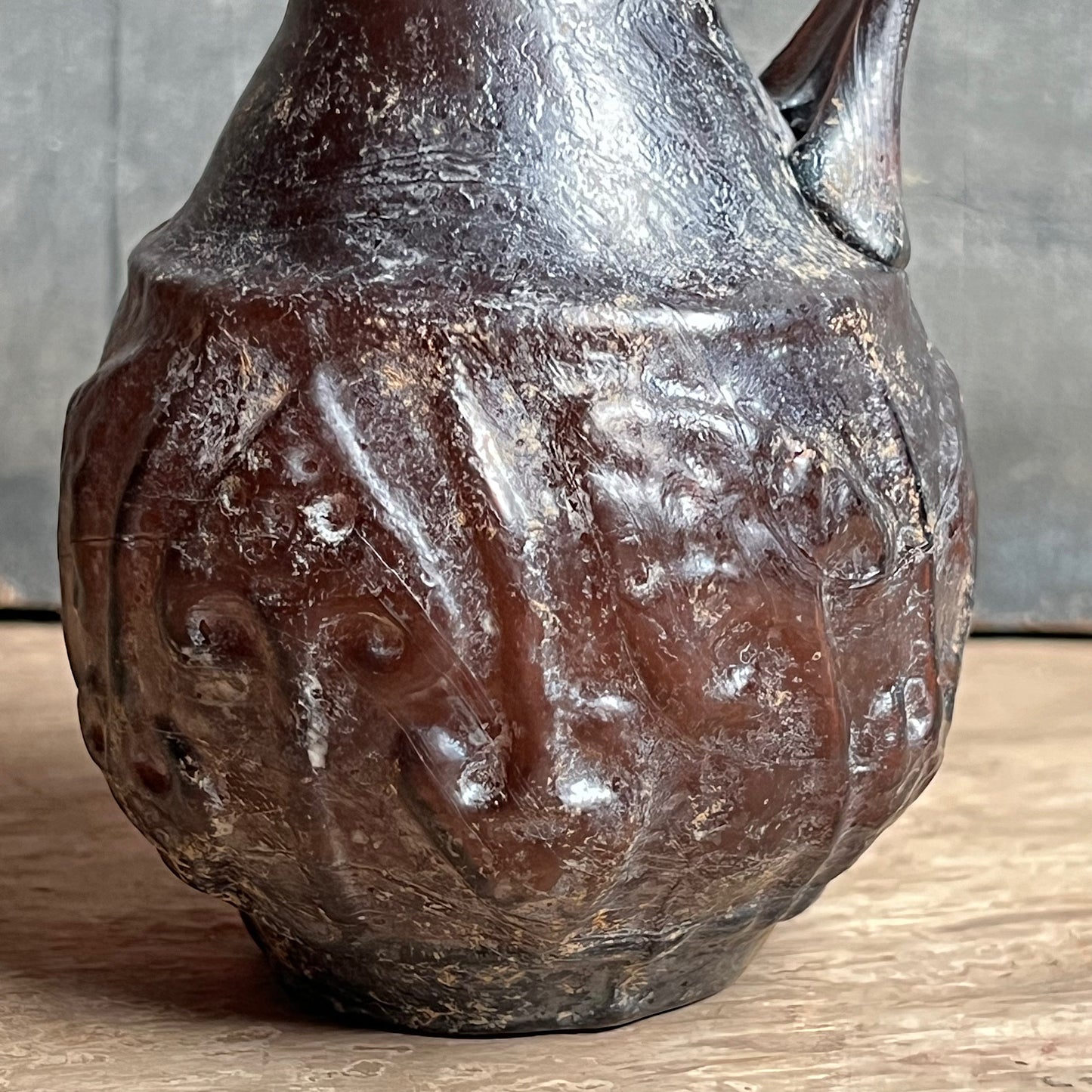A Roman Aubergine Glass Trefoil-Lipped Jug c. 1st Century A.D.
