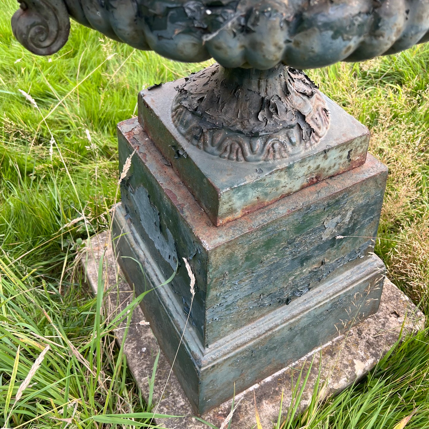 Pair of English Cast Iron Garden Urns with Plinths c.1870