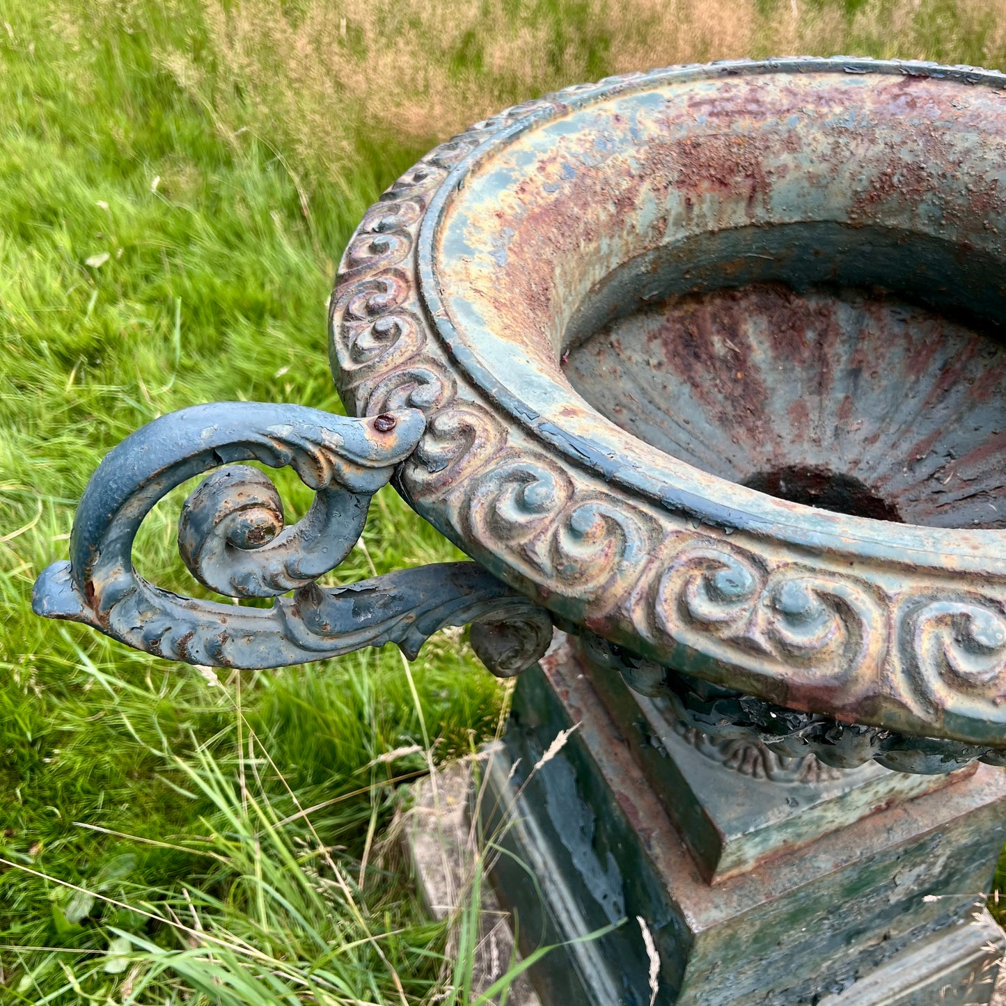 Pair of English Cast Iron Garden Urns with Plinths c.1870