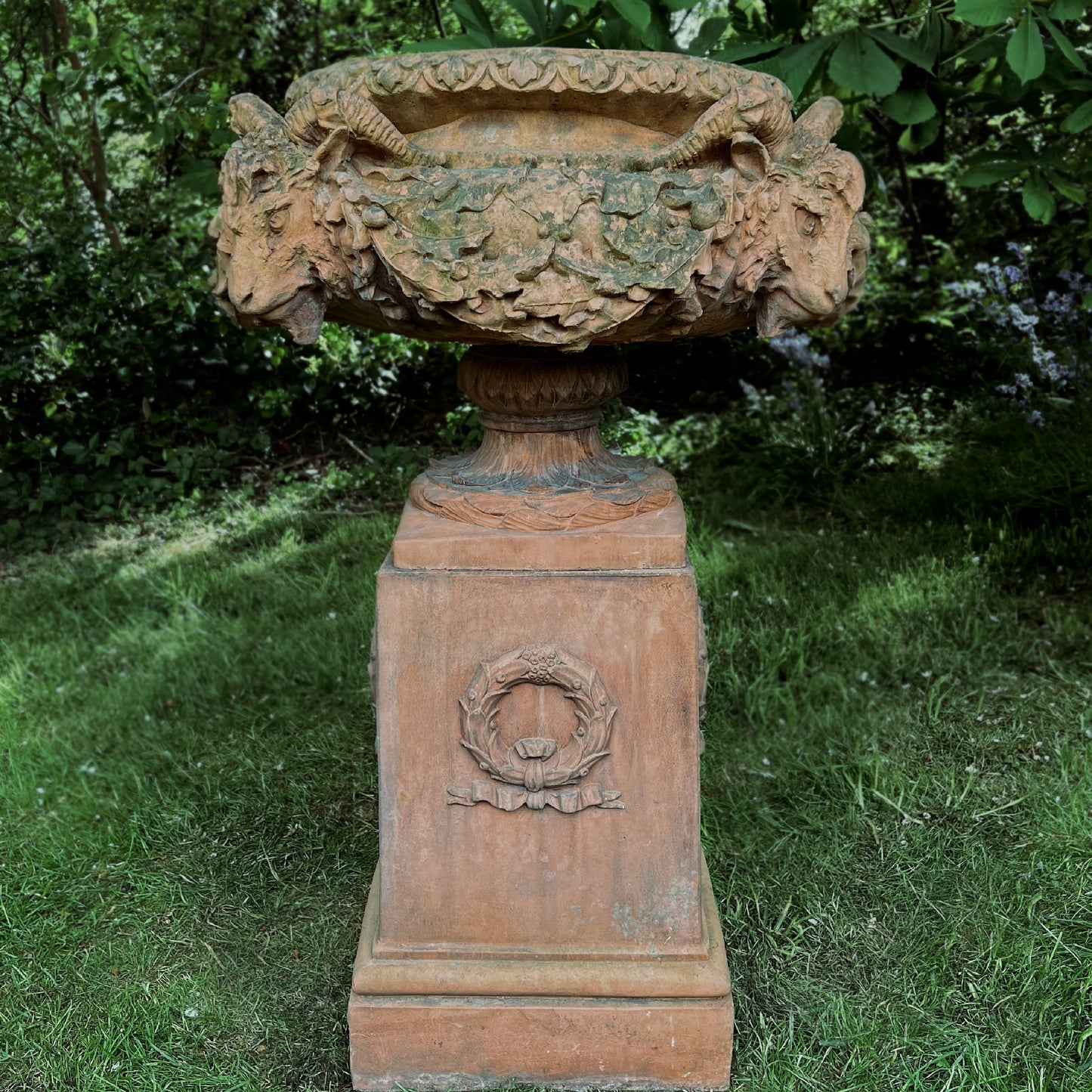 An Italian Neoclassical Style Terracotta Centrepiece Urn with Plinth