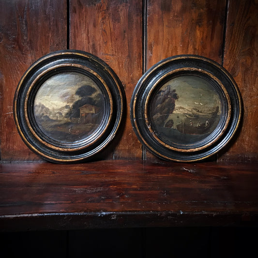 A Pair of Italian School Ebonised Tondos c.1740