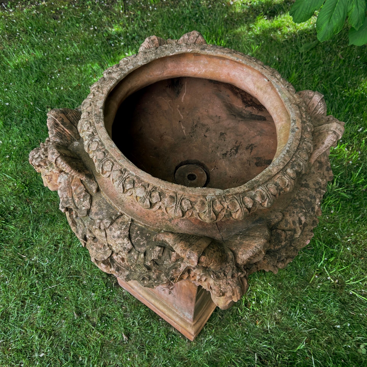 An Italian Neoclassical Style Terracotta Centrepiece Urn with Plinth