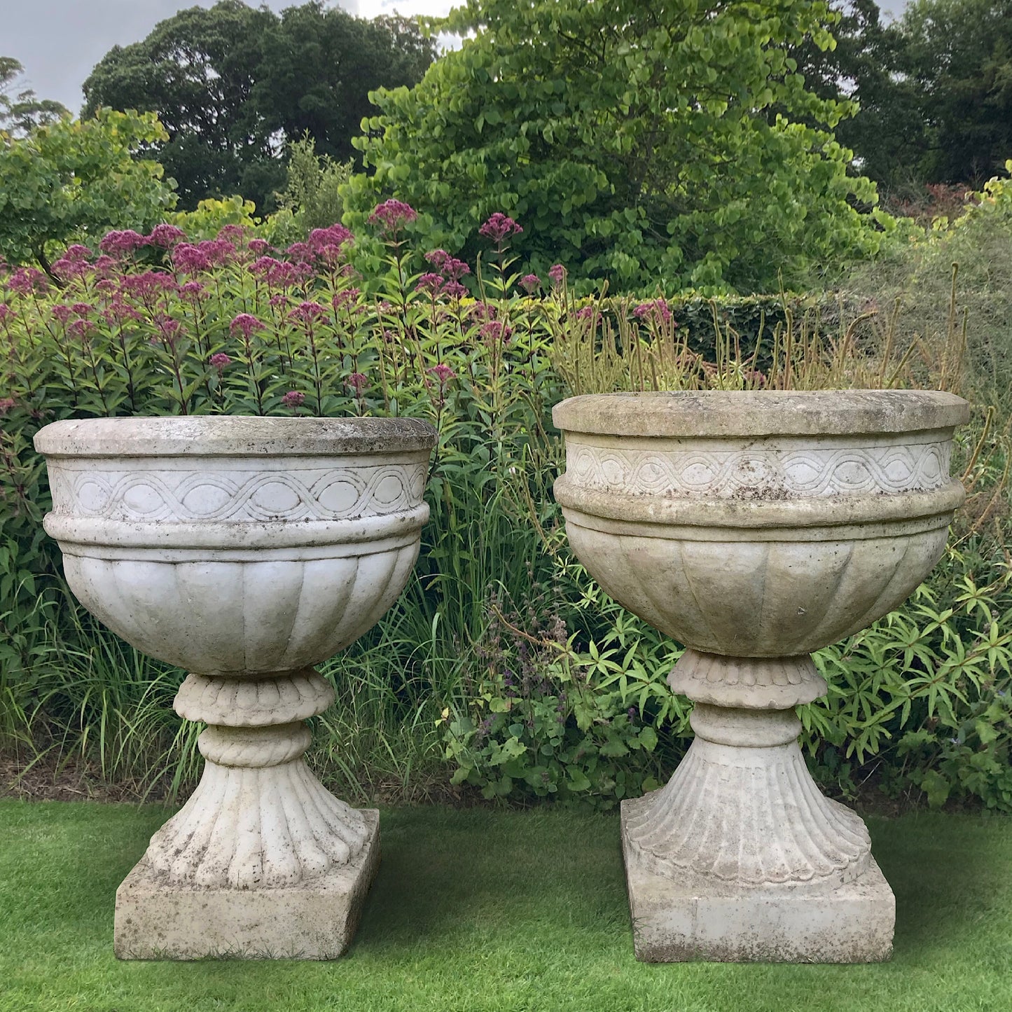 Pair of Carved White Marble Urns