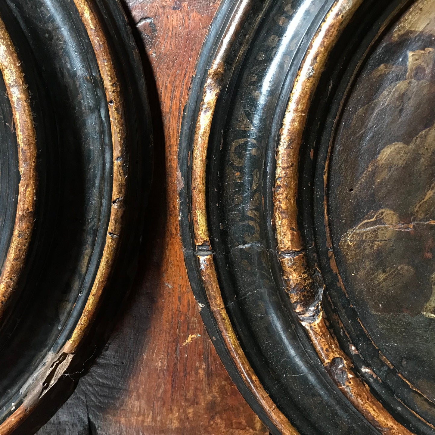 A Pair of Italian School Ebonised Tondos c.1740