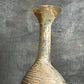 A Roman Pale Yellow Glass Flask c. 1st Century A.D.