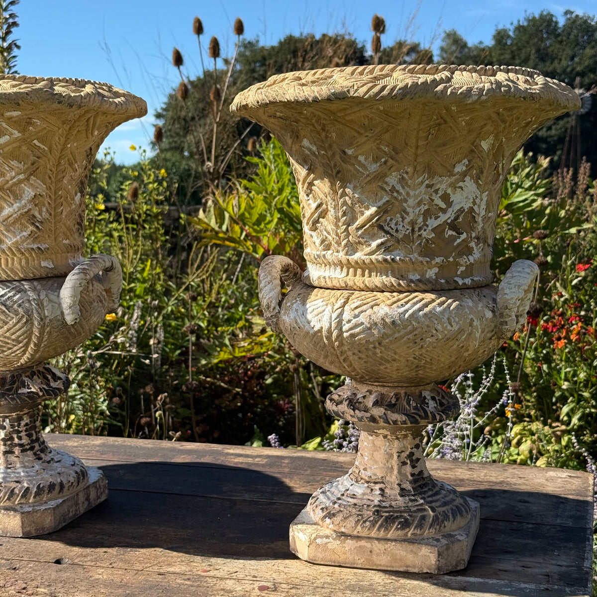A Set of Four English Buff Terracotta Basket-Weave Garden Urns, c.1860–1880