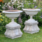Pair of English Victorian Cast Iron Garden Urns on Ornamented Bases