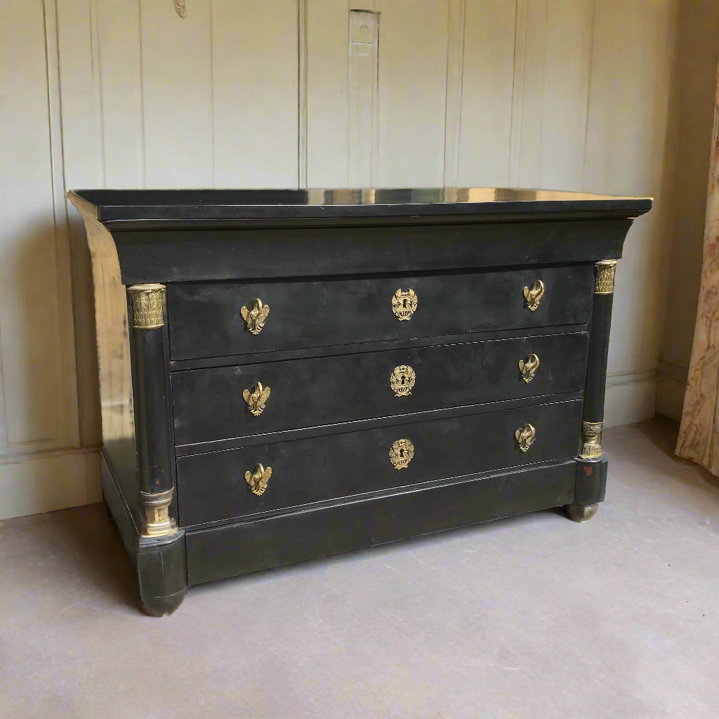 Black dresser with gold accents 