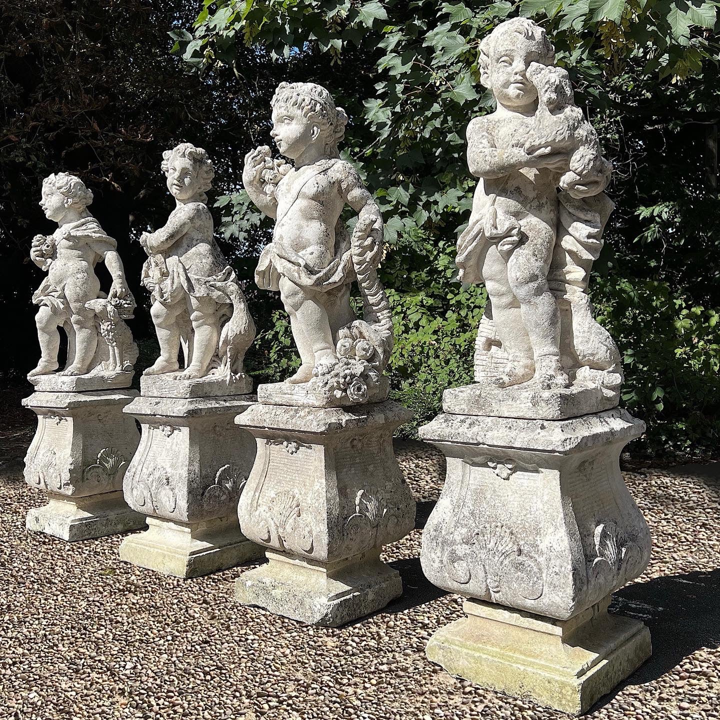 French Limestone Four Seasons Statues with Plinths c. Late 17th/Early 18th Century