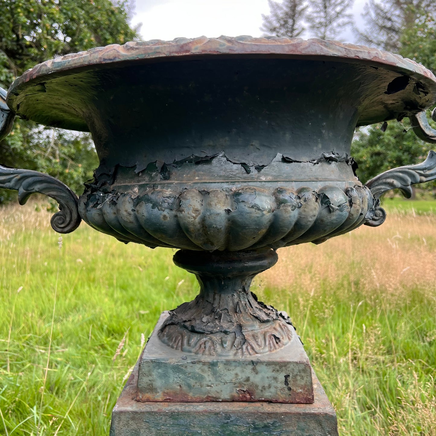 Pair of English Cast Iron Garden Urns with Plinths c.1870