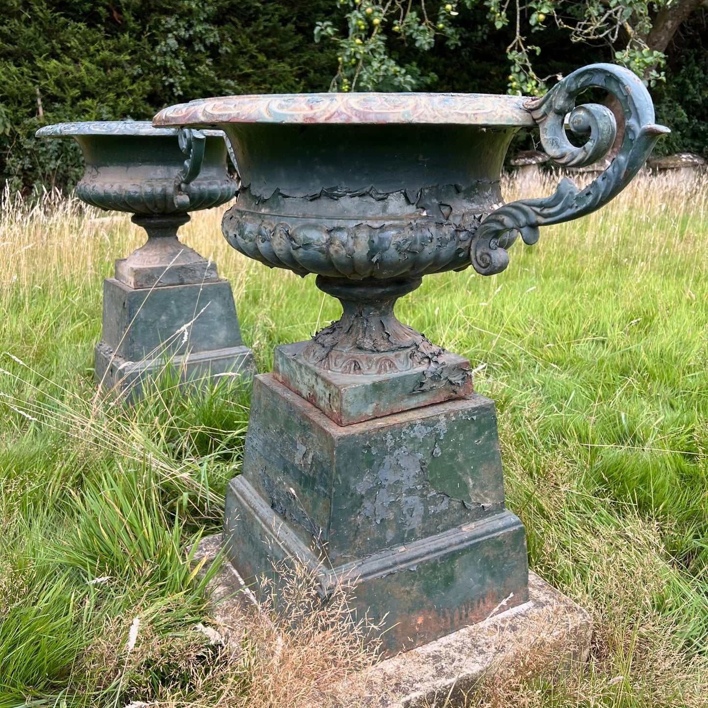 Pair of English Cast Iron Garden Urns with Plinths c.1870
