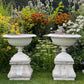 Pair of English Victorian Cast Iron Garden Urns on Ornamented Bases