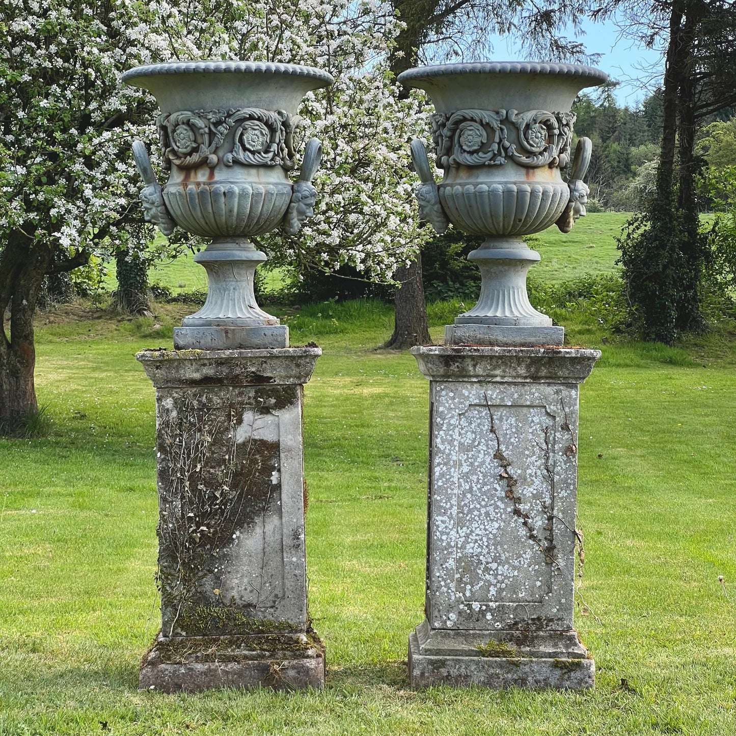 Exceptional Pair of English Campana Cast Iron Urns by Handyside Co. c.1870 with Plinths
