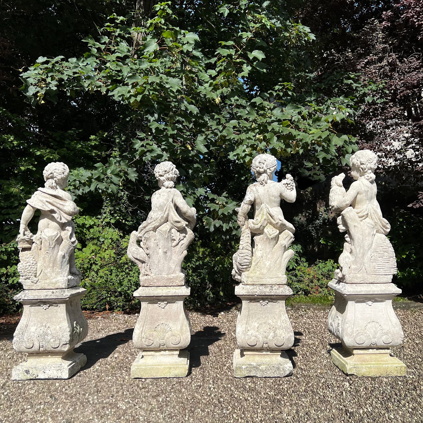 French Limestone Four Seasons Statues with Plinths c. Late 17th/Early 18th Century