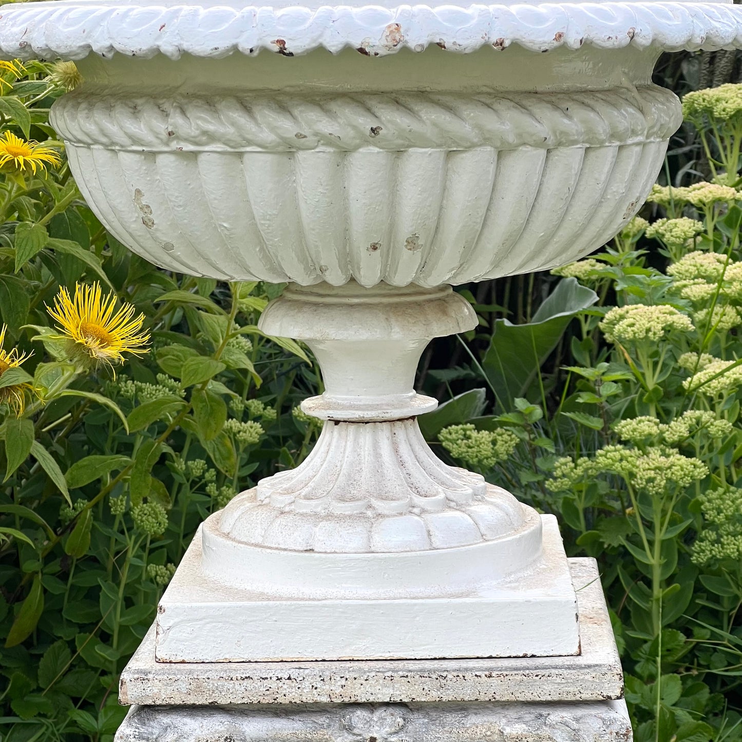 Pair of English Victorian Cast Iron Garden Urns on Ornamented Bases