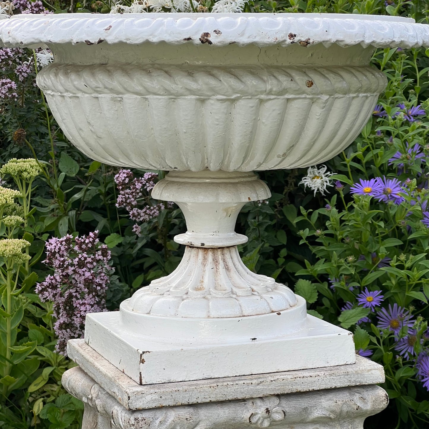 Pair of English Victorian Cast Iron Garden Urns on Ornamented Bases