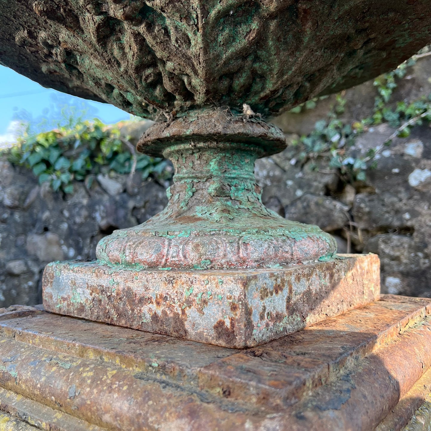 Pair of French Cast Iron Tazza Urns on Sandstone Plinths c.1880