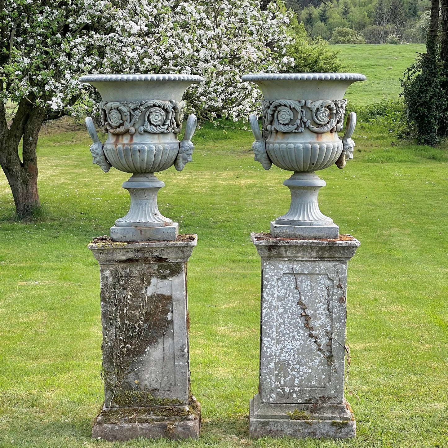Exceptional Pair of English Campana Cast Iron Urns by Handyside Co. c.1870 with Plinths