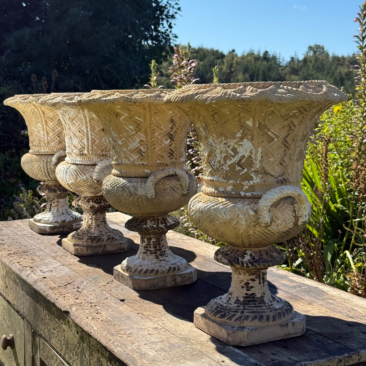 A Set of Four English Buff Terracotta Basket-Weave Garden Urns, c.1860–1880