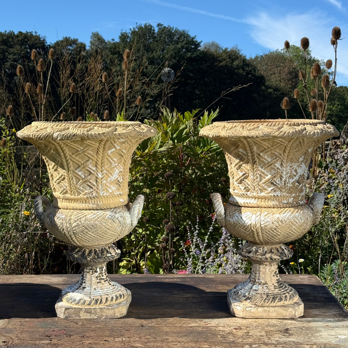 A Set of Four English Buff Terracotta Basket-Weave Garden Urns, c.1860–1880