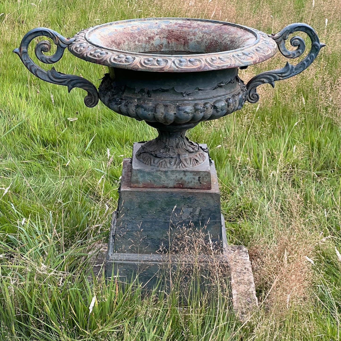 Pair of English Cast Iron Garden Urns with Plinths c.1870