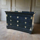 Black dresser with gold accents 