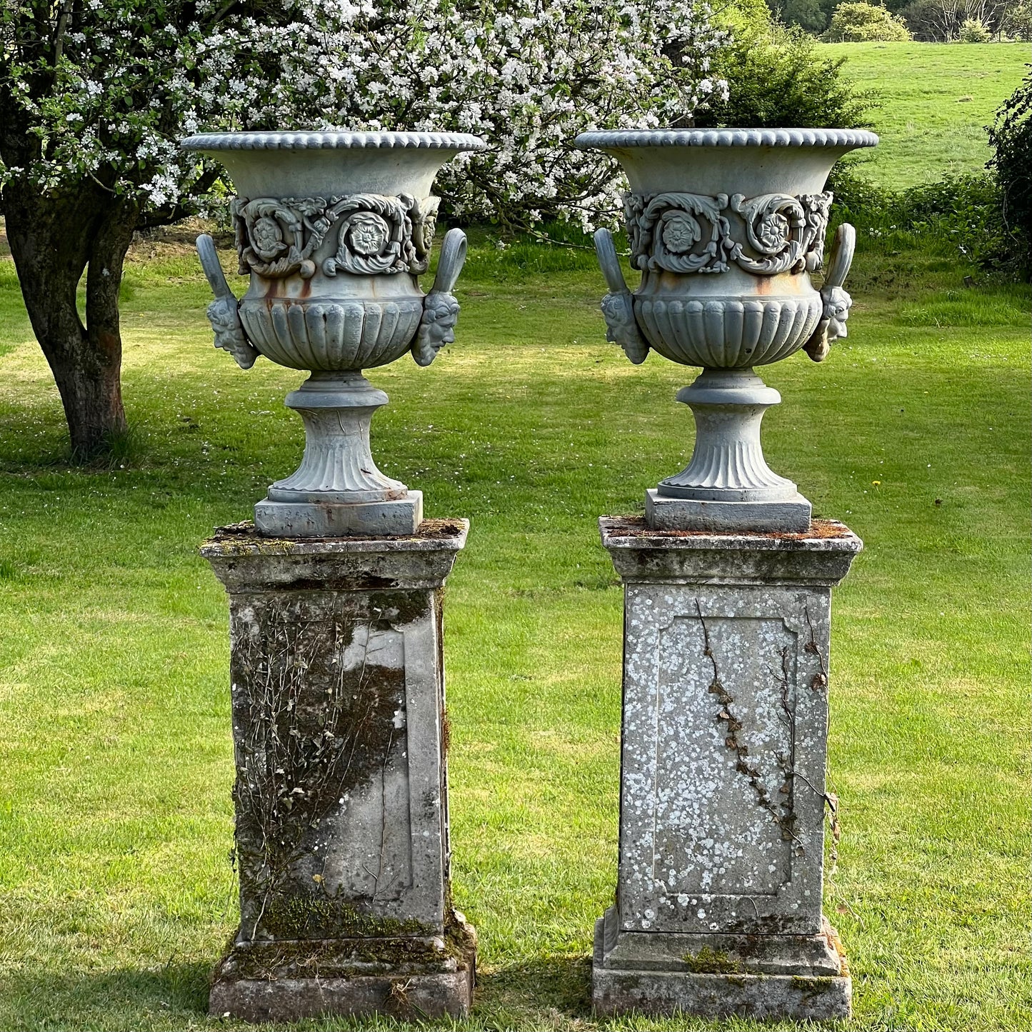 Exceptional Pair of English Campana Cast Iron Urns by Handyside Co. c.1870 with Plinths