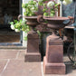 Pair of French Cast Iron Urns with Plinths