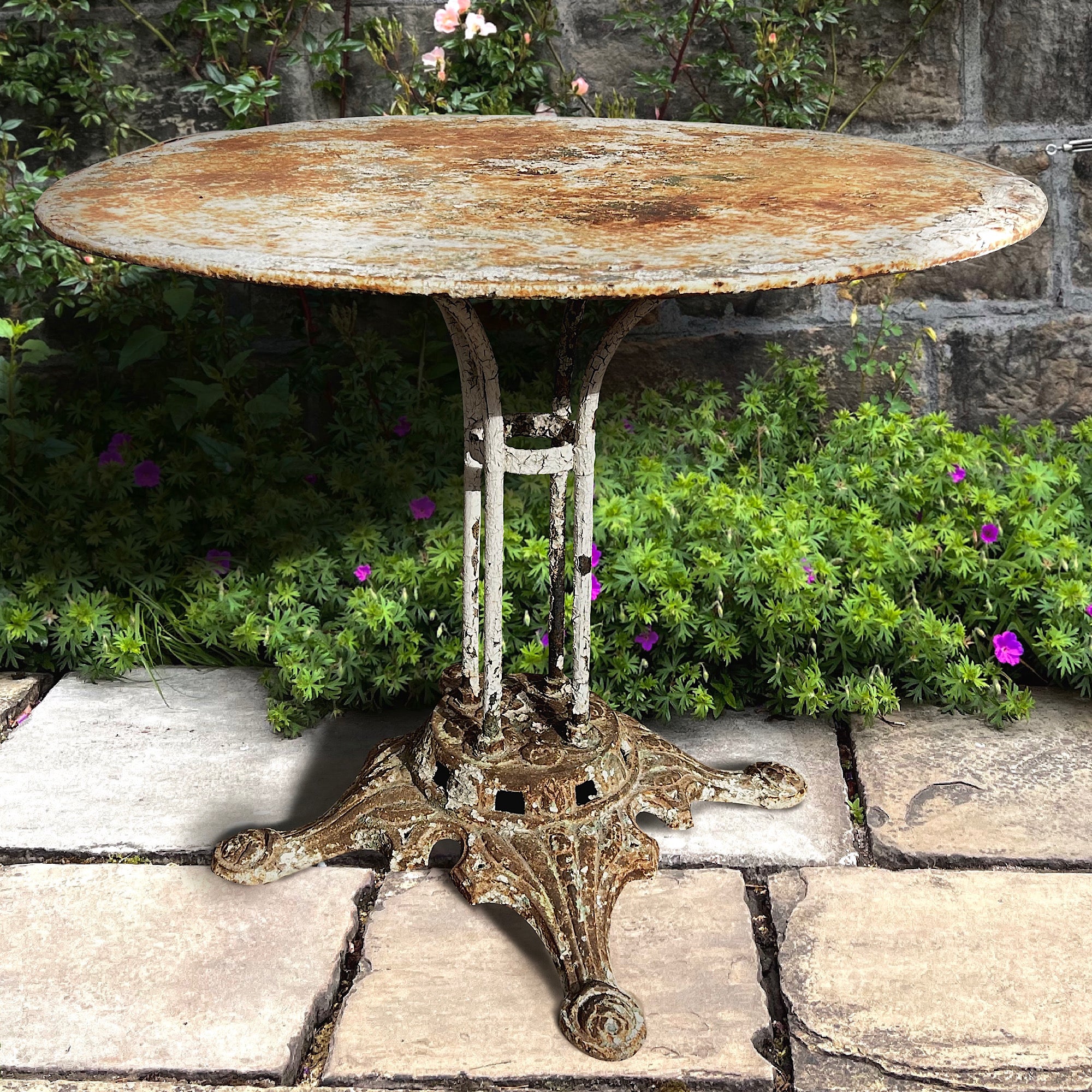 Vintage cast deals iron garden table