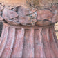 Monolithic Terracotta Rams Head and Winged Maiden Urn