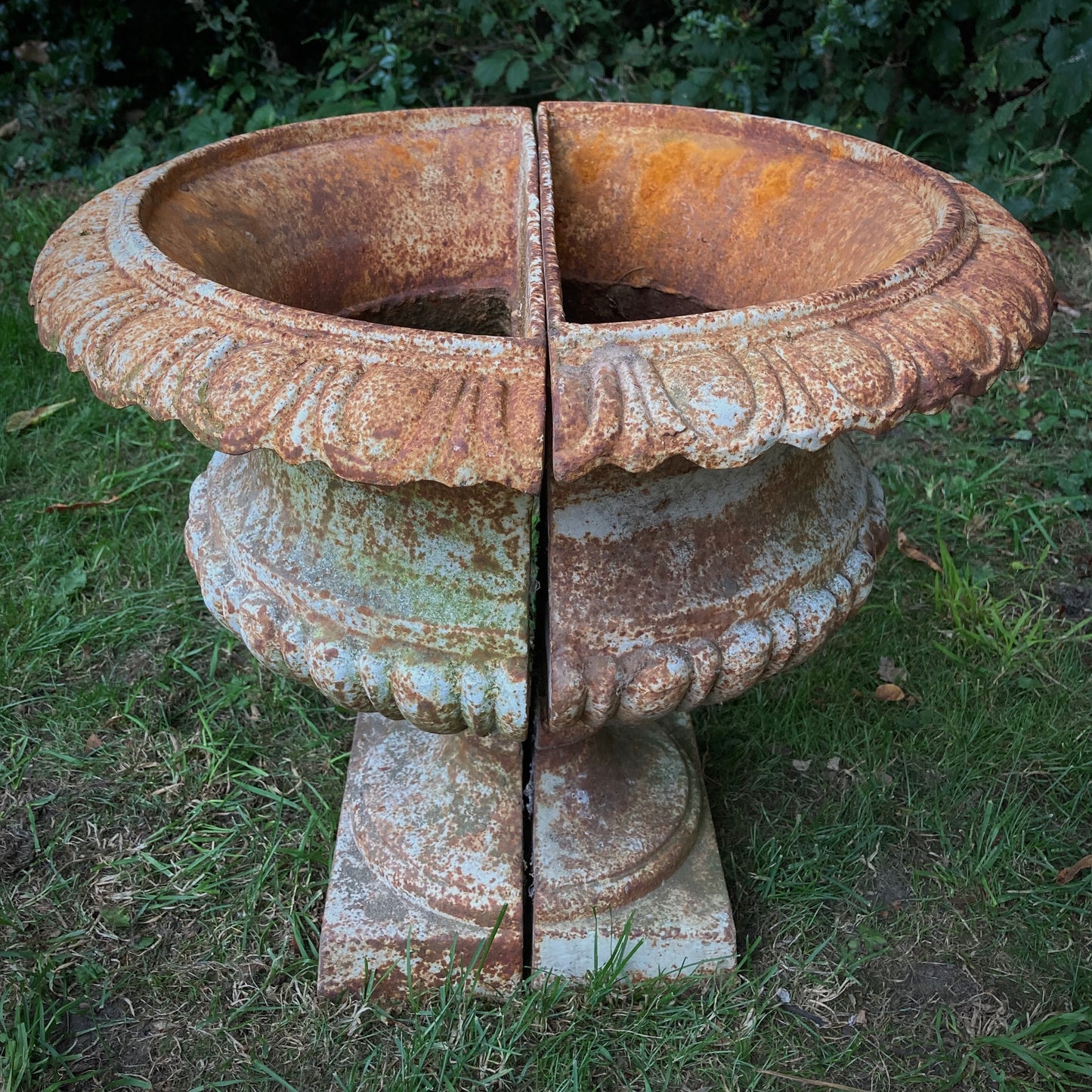 Pair of French Demilune Cast Iron Urns