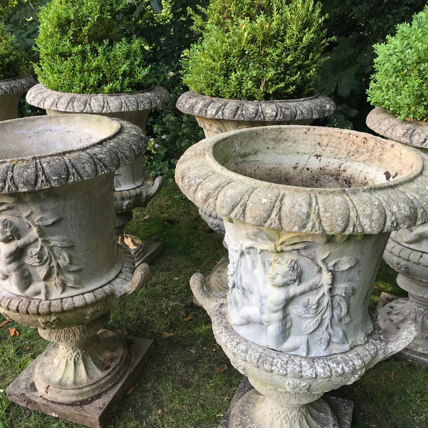 Set of 8 Dancing Putti Campana Urns