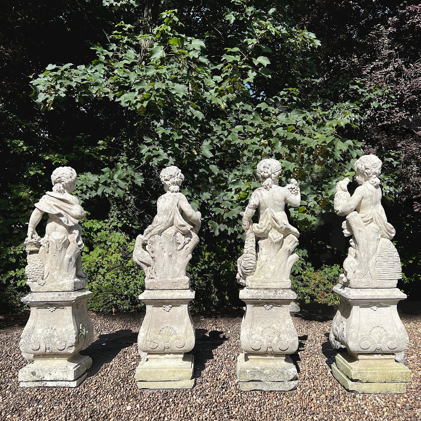 French Limestone Four Seasons Statues with Plinths c. Late 17th/Early 18th Century