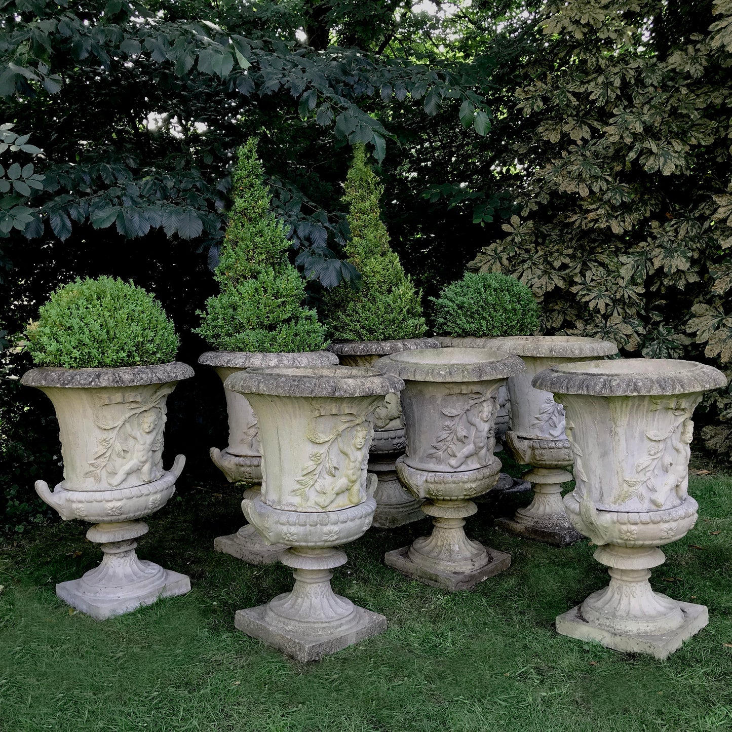 Set of 8 Dancing Putti Campana Urns