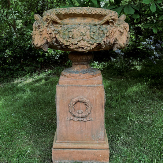 An Italian Neoclassical Style Terracotta Centrepiece Urn with Plinth