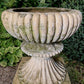 A Pair of Buff Terracotta Urns with Plinths c.1860