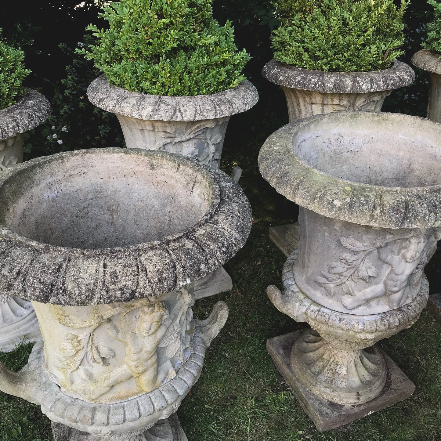 Set of 8 Dancing Putti Campana Urns