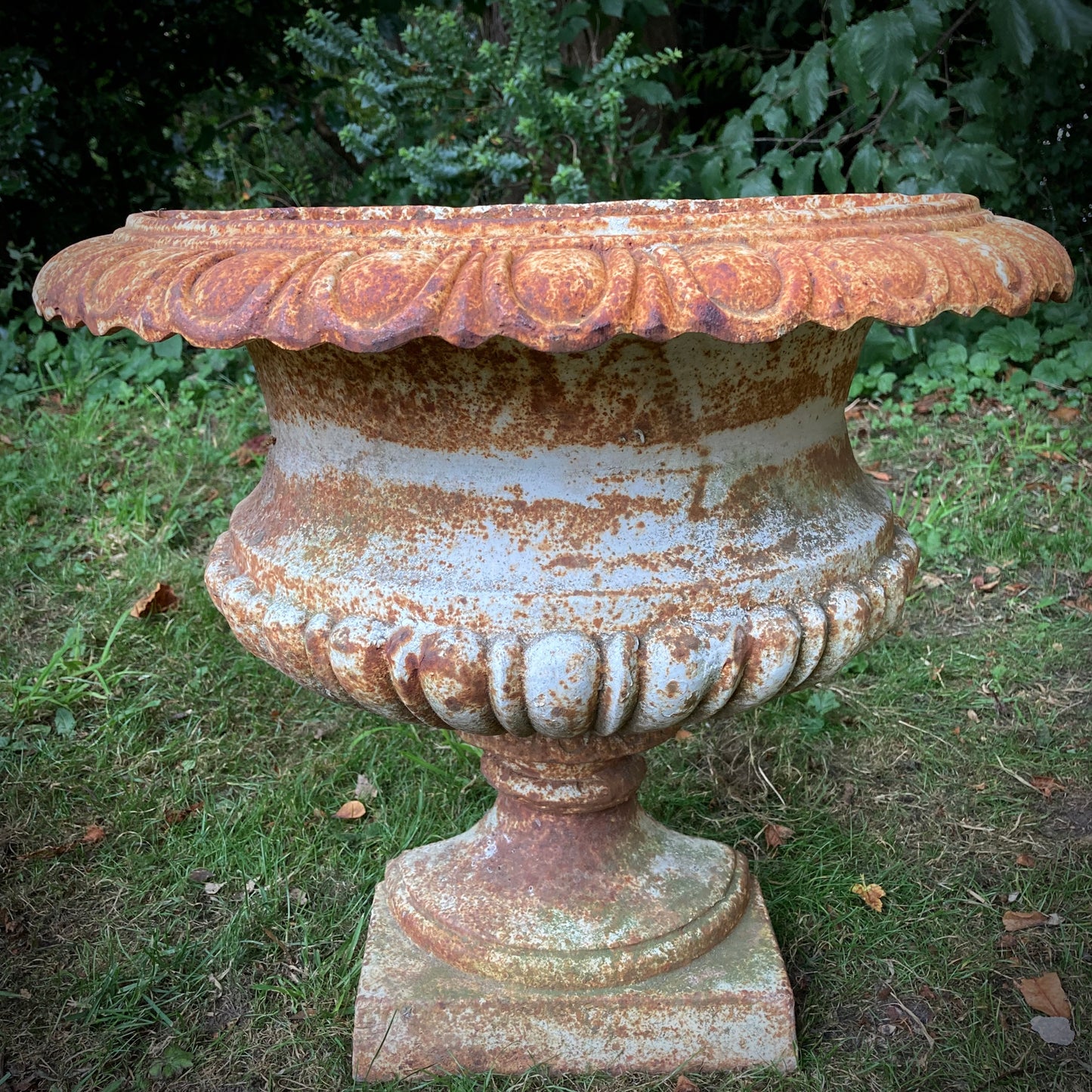 Pair of French Demilune Cast Iron Urns